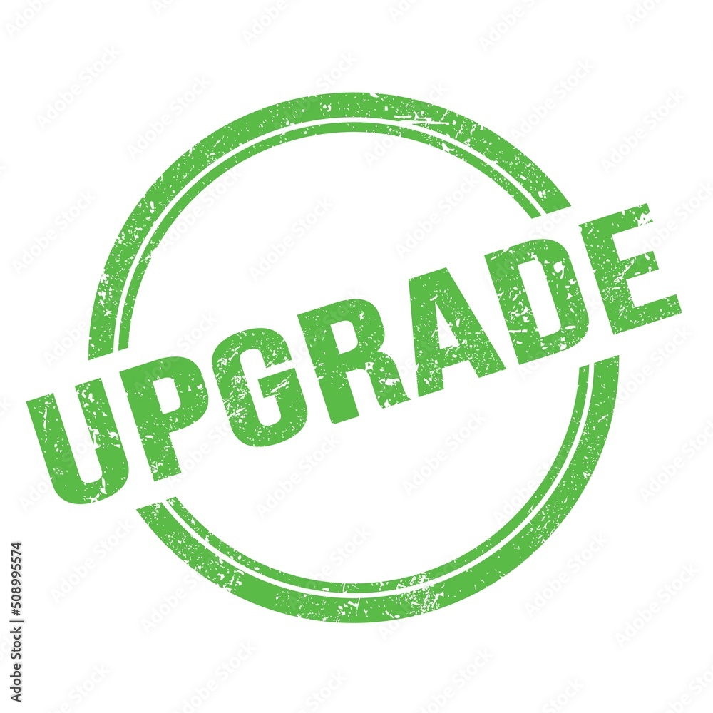 UPGRADE text written on green grungy round stamp. UPGRADE text written on green grungy round stamp.