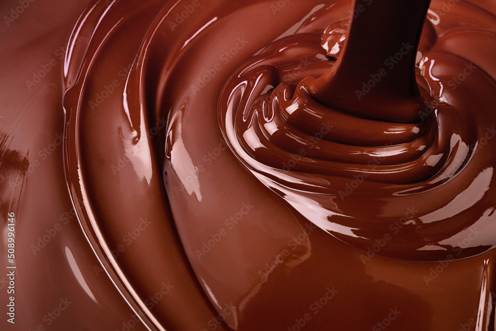 melt dark chocolate background. pouring liquid cocoa dessert melt dark chocolate background. pouring liquid cocoa dessert