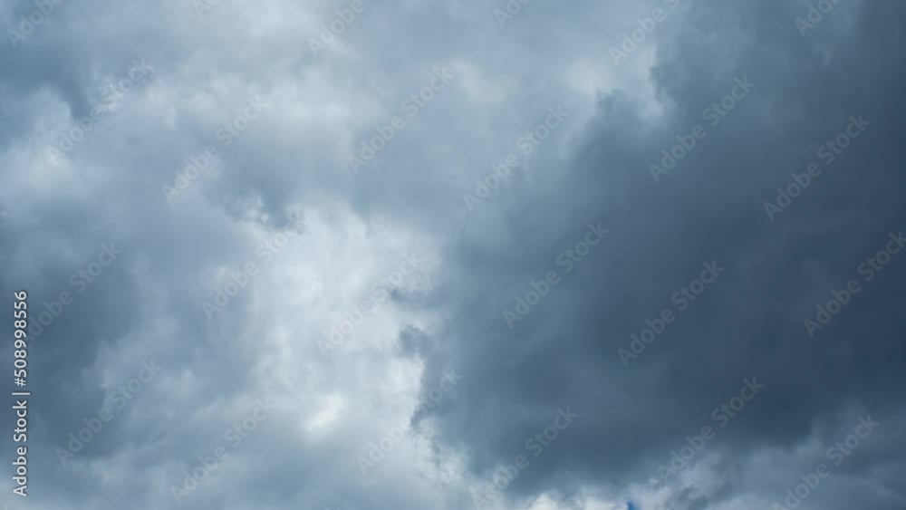 Timelapse of the blue sky with white-gray clouds. Close-up of the sky with clouds. Nature weather. Background Video Timelapse of the blue sky with white-gray clouds. Close-up of the sky with clouds. Nature weather. Background Video
