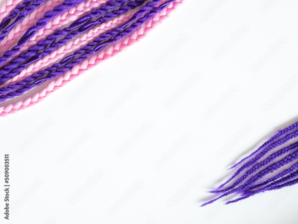 Fototapeta premium Purple and pink kanekolon afro braids, space for text