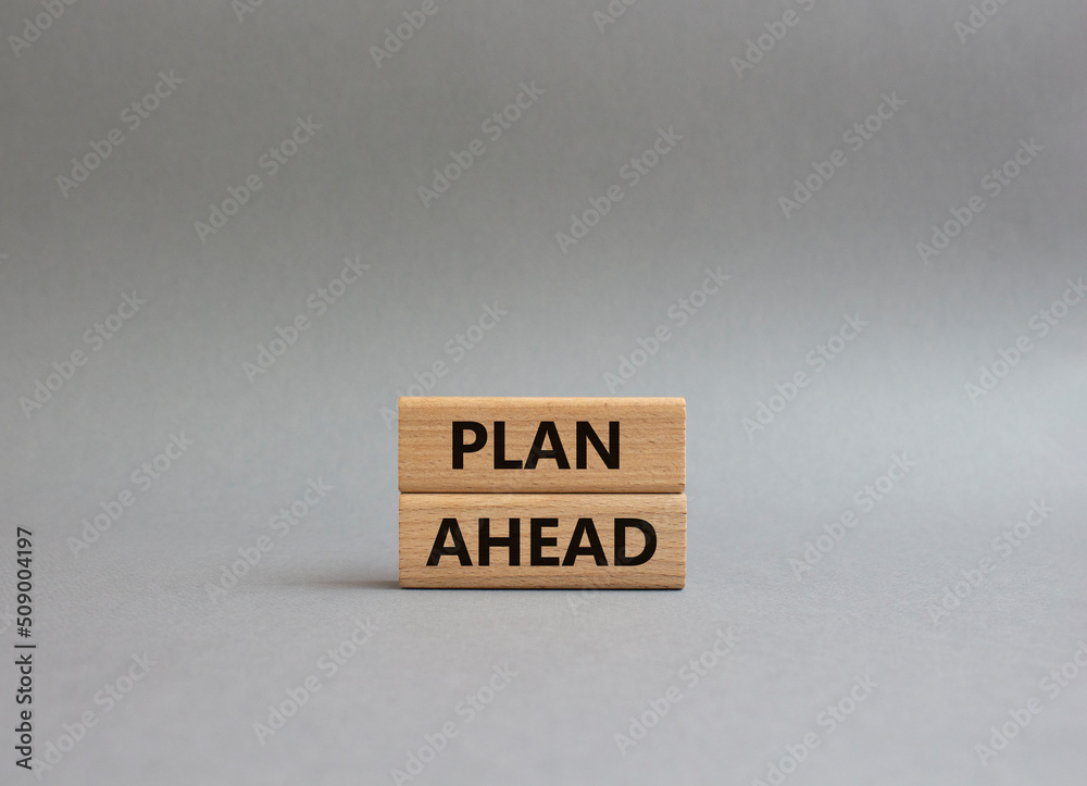 Plan ahead symbol. Wooden blocks with words Plan ahead. Beautiful grey background. Business and 'Plan ahead' concept. Copy space. Plan ahead symbol. Wooden blocks with words Plan ahead. Beautiful grey background. Business and 'Plan ahead' concept. Copy space.
