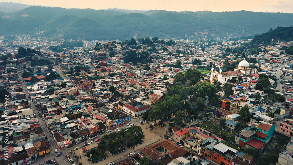 Aerial of san Cristobal de las casas chiapas Mexico with mountains landscape, drone panoramic of village town city of central Mexican region