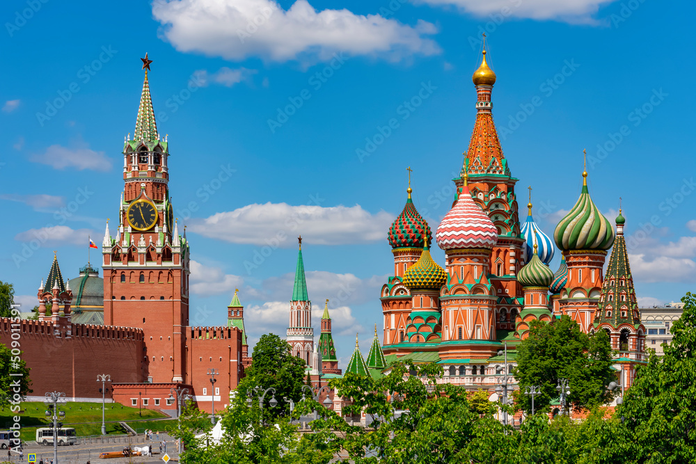 Moscow cityscape with Cathedral of Vasily the Blessed (Saint Basil's Cathedral) and Spasskaya Tower on Red Square, Russia Moscow cityscape with Cathedral of Vasily the Blessed (Saint Basil's Cathedral) and Spasskaya Tower on Red Square, Russia