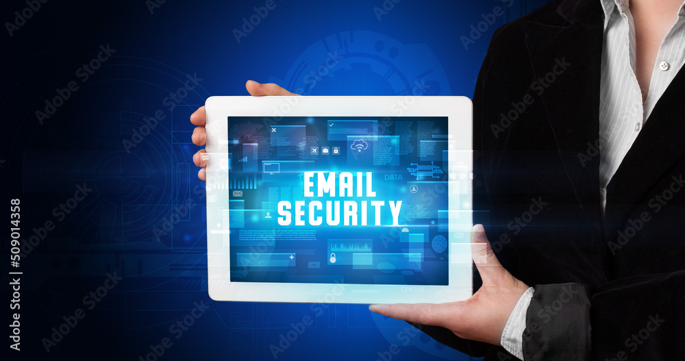 Person holding tablet, security concept Person holding tablet, security concept