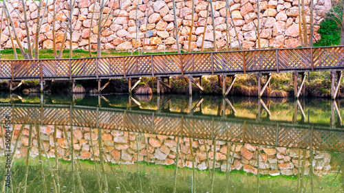 Pasarela de madera en la orilla del rio Duero a su paso por Soria photo