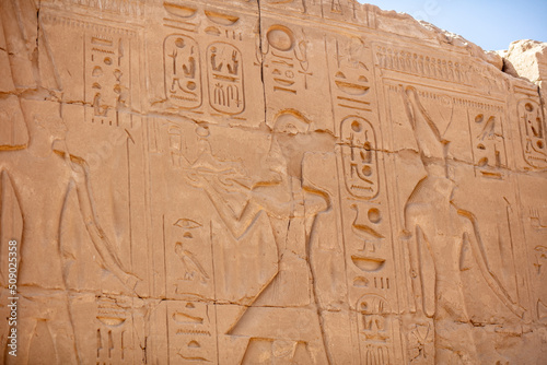 Different hieroglyphs on the walls and columns in the Karnak temple. Karnak temple is the largest complex in ancient Egypt.
