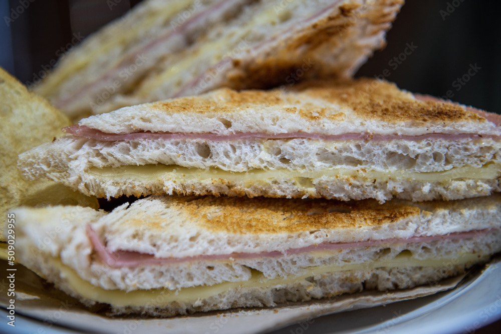 Sándwich de miga tostado Carlitos jamón y queso Stock Photo Adobe Stock