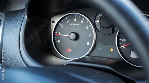 Empty fuel gas gauge. Car tank low petrol meter indicator on dashboard. Fuel car gauge empty. photo