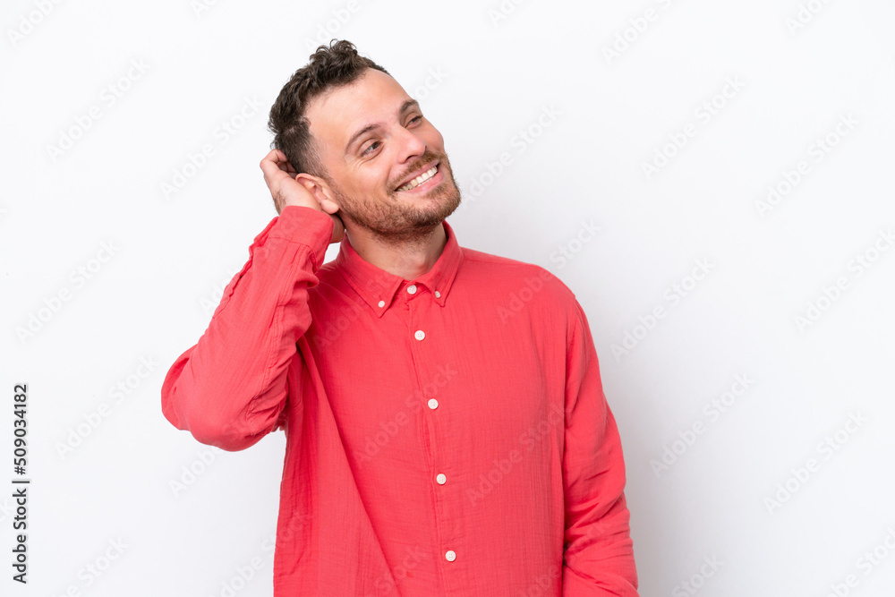 Young Brazilian man isolated on white background thinking an idea