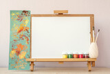 Blank white paper for painting on wooden easel on table at home studio