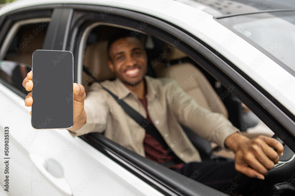 Happy man showing big blank smartphone to camera while sitting in car, collage