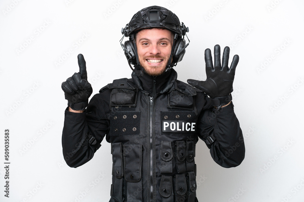 Brazilian soldier man isolated on white background counting six with fingers Brazilian soldier man isolated on white background counting six with fingers