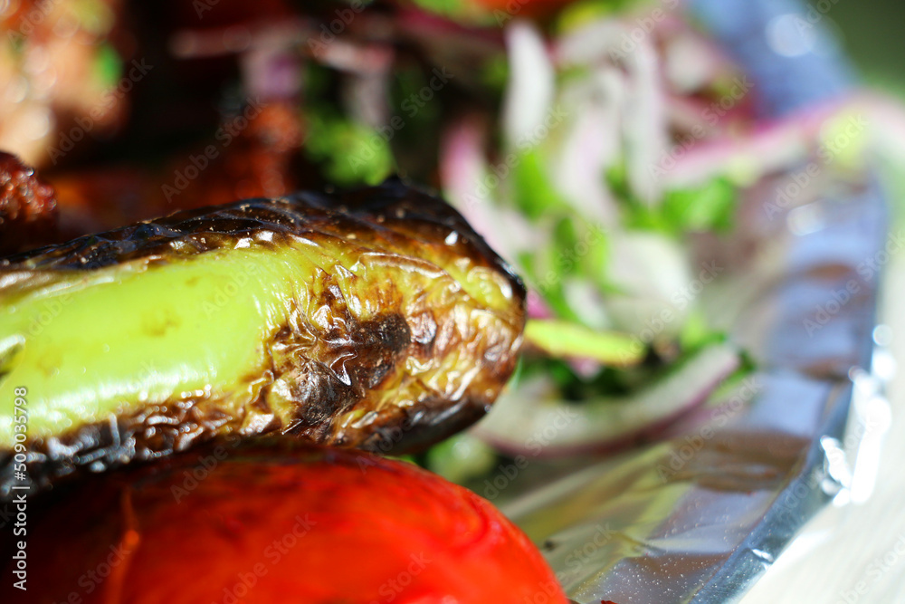 Kebab, one of Turkey's famous local dishes, is served to the customer with cold onions and salad, mixed Turkish kebab. Kebab, one of Turkey's famous local dishes, is served to the customer with cold onions and salad, mixed Turkish kebab.