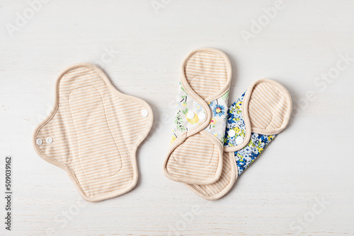 Zero waste periods kit. Eco friendly feminine hygiene, reuse concept. Reusable sanitary pads for personal hygiene. Waste-free lifestyle.