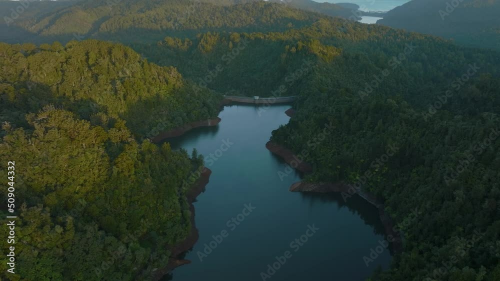 Aerial: Beautiful reservoir lake and rainforest, New Zealand Aerial: Beautiful reservoir lake and rainforest, New Zealand