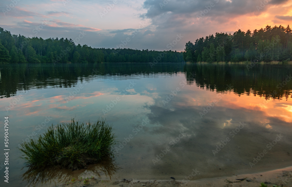 Sunset around the summer lake