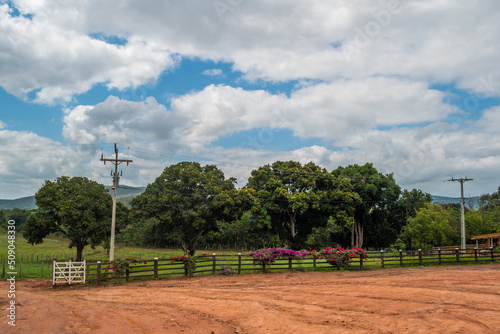 Gate of a farm with trees near the Mosquito waterfall in Chapada Diamantina, Bahia, Brazil