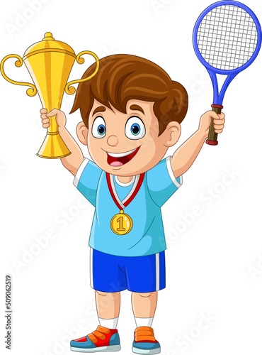 Little boy holding gold medal and tennis trophy