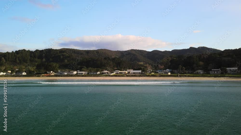 Surf waves in small New Zealand town Surf waves in small New Zealand town