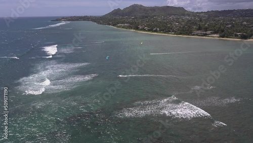 Aerial view of kitesurfer sailing along Waialae beach in Oahu Hawaii 4 photo