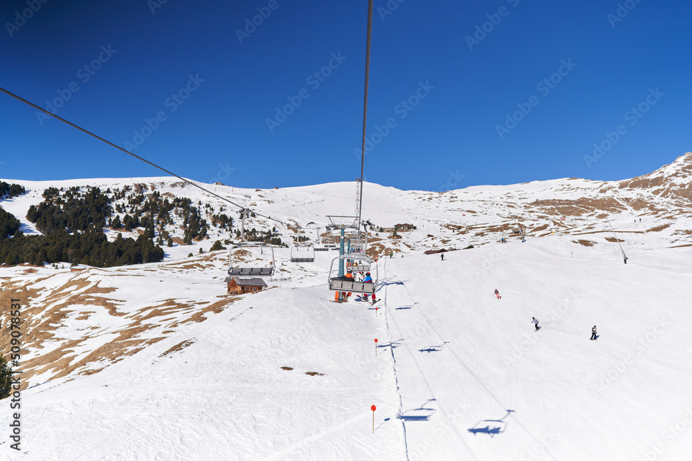 View from Seceda Chairlift. Ski Slopes beneath lift. Beautiful Aerial Winter Landscape View from Seceda Chairlift. Ski Slopes beneath lift. Beautiful Aerial Winter Landscape