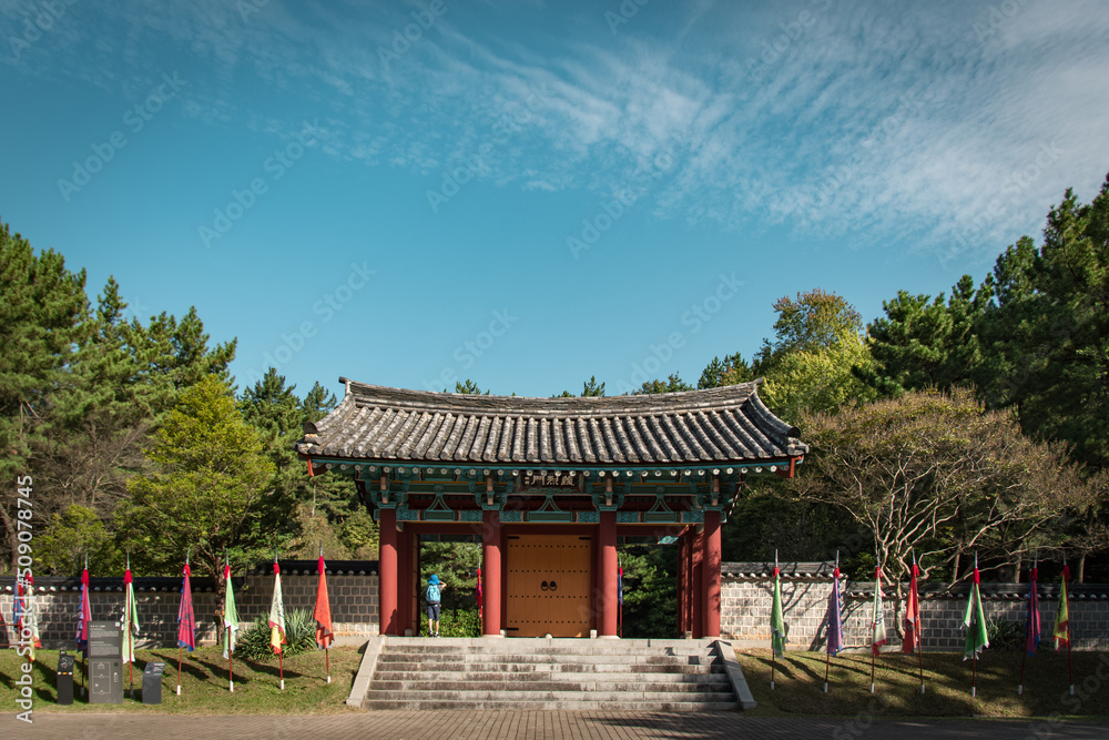 Korean architecture, facade of Korean architecture, blue sky, mountains, and architecture