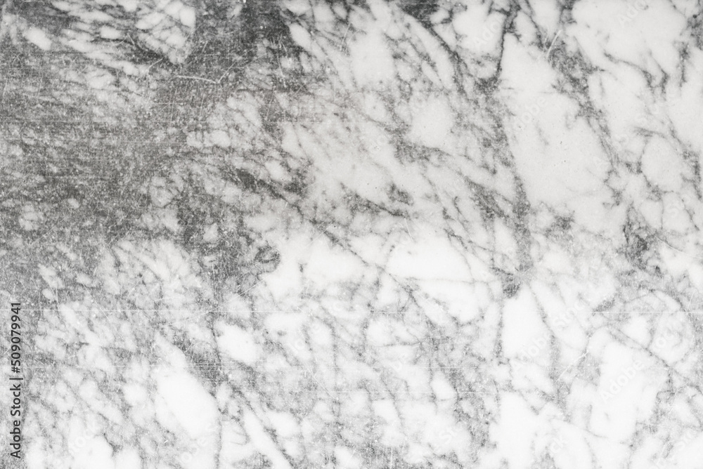 The texture of natural white marble made of natural tiles is a luxurious background for design works