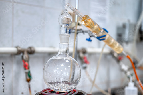 Flask with boiling alcohol at distillation in laboratory