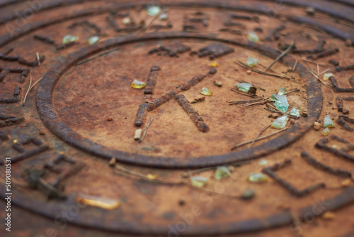 Rusty manhole cap grunge manhole cover with clipping path