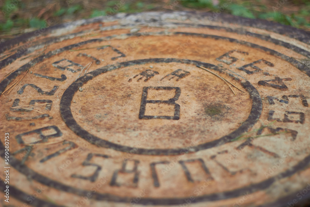 Rusty manhole cap grunge manhole cover with clipping path