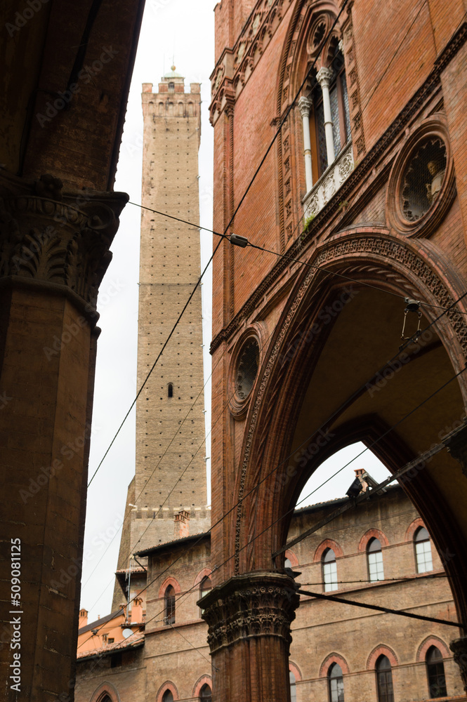 Asinelli Tower of the two towers of Bologna seen from narrow street