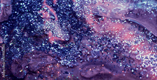 Glitter ink background. Paint mix. Shimmering liquid leak. Blur blue purple pink shiny wet fluid flow motion. Abstract texture shot on RED Cinema camera.