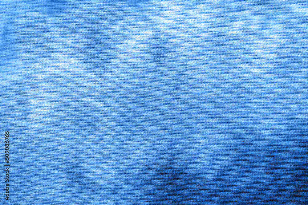 Abstract tie dye indigo blue fabric cloth Boho pattern texture for background or groovy wedding card, sale flyer, 60s, 70s poster, kid tie-dye diy backdrop. Modern Watercolor Wet Brush Fabrics Art Abstract tie dye indigo blue fabric cloth Boho pattern texture for background or groovy wedding card, sale flyer, 60s, 70s poster, kid tie-dye diy backdrop. Modern Watercolor Wet Brush Fabrics Art