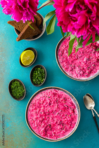 Cold soup svekolnik, Borscht or Chlodnik , soup made from boiled beets, potatoes and fresh vegetables photo