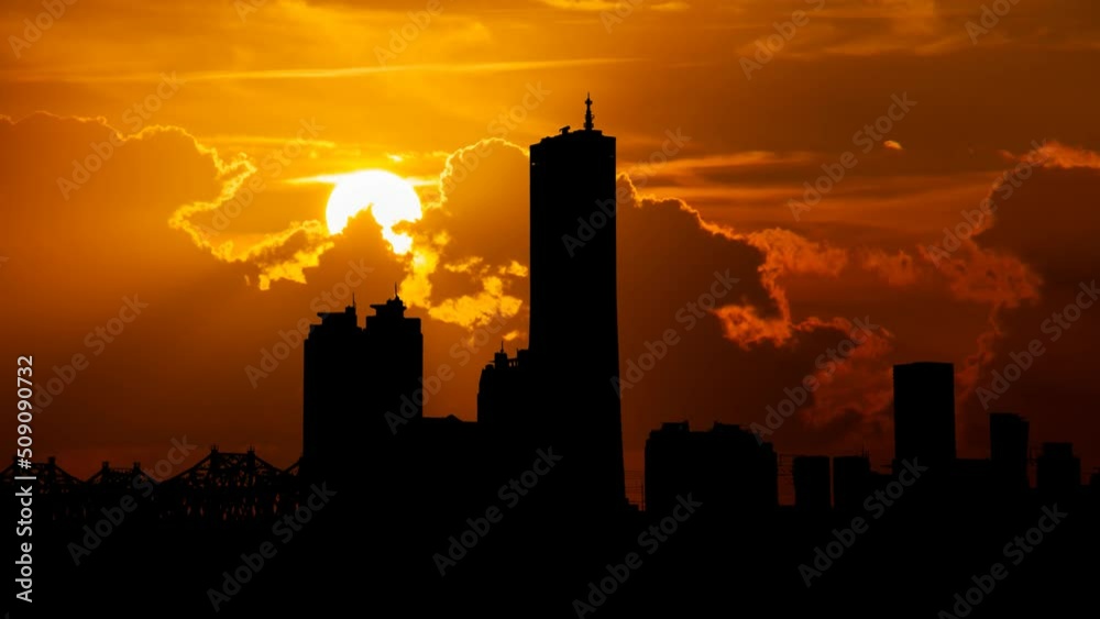 Seoul Yeoeuido financial district skyscrapers at Sunset, Time Lapse with Red Sky and Fiery Sun, South Korea