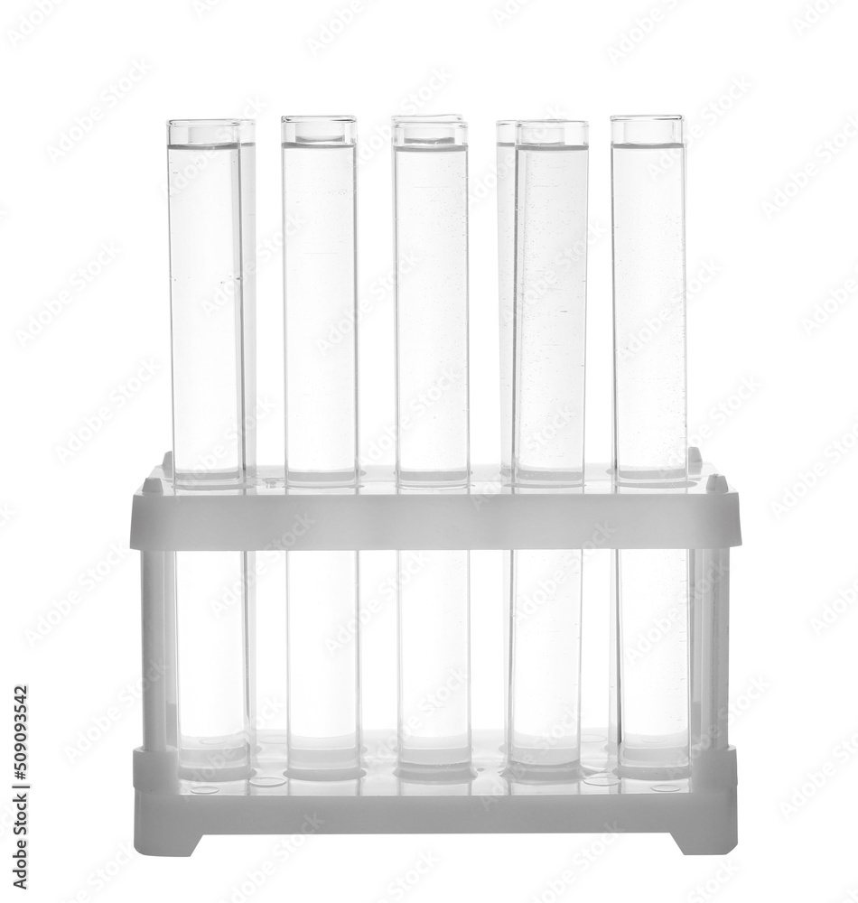 Test tubes with transparent liquid in holder isolated on white Test tubes with transparent liquid in holder isolated on white
