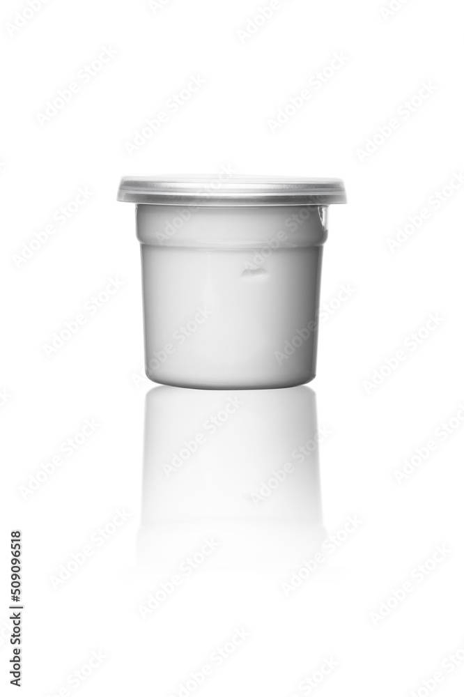 white cream or face mask in transparent package with metal tin lid, isolated on white background with reflection white cream or face mask in transparent package with metal tin lid, isolated on white background with reflection