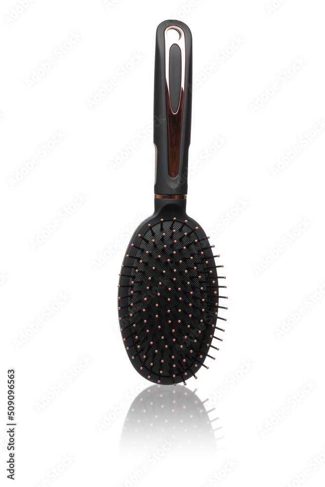 Hairbrush isolated on white background. Black and gold hair brush cut out. Design element. Personal grooming accessory with reflection Hairbrush isolated on white background. Black and gold hair brush cut out. Design element. Personal grooming accessory with reflection