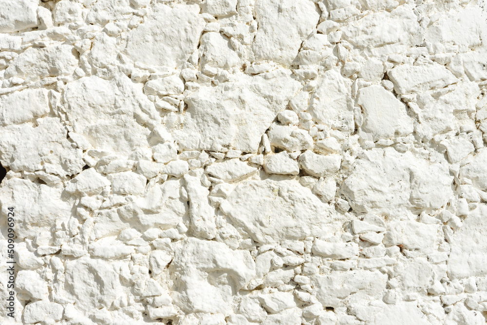 White plaster wall texture with crack background. Pattern of white plaster wall in rough aged structure White plaster wall texture with crack background. Pattern of white plaster wall in rough aged structure