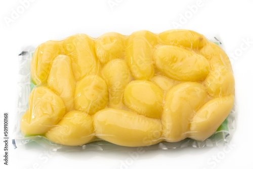 Potatoes in vacuum packed sealed for sous vide cooking isolated on white background