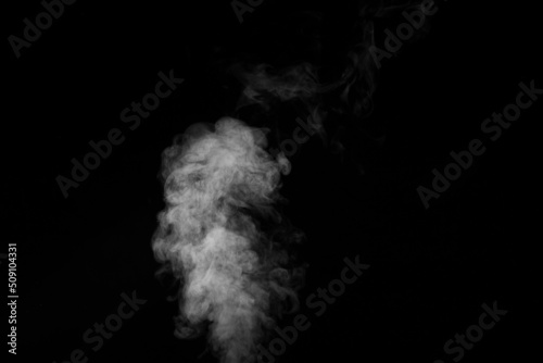 Smoke movement on a black background, smoke background, abstract smoke on a black background. Design element to overlay on your photos