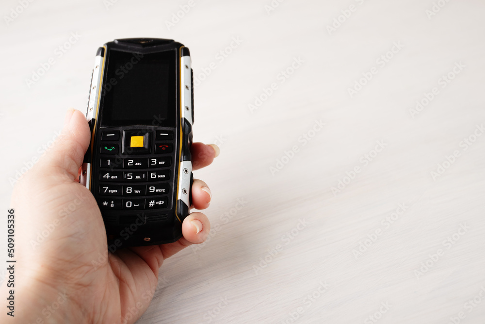 shockproof key phone, mobile telephone with buttons, old type shockproof key phone, mobile telephone with buttons, old type