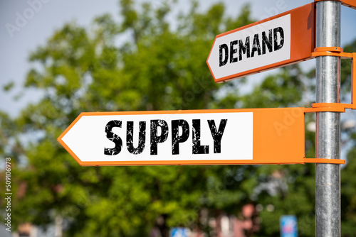 Demand and Supply concept. Directional arrows with text, sunny day © STOATPHOTO