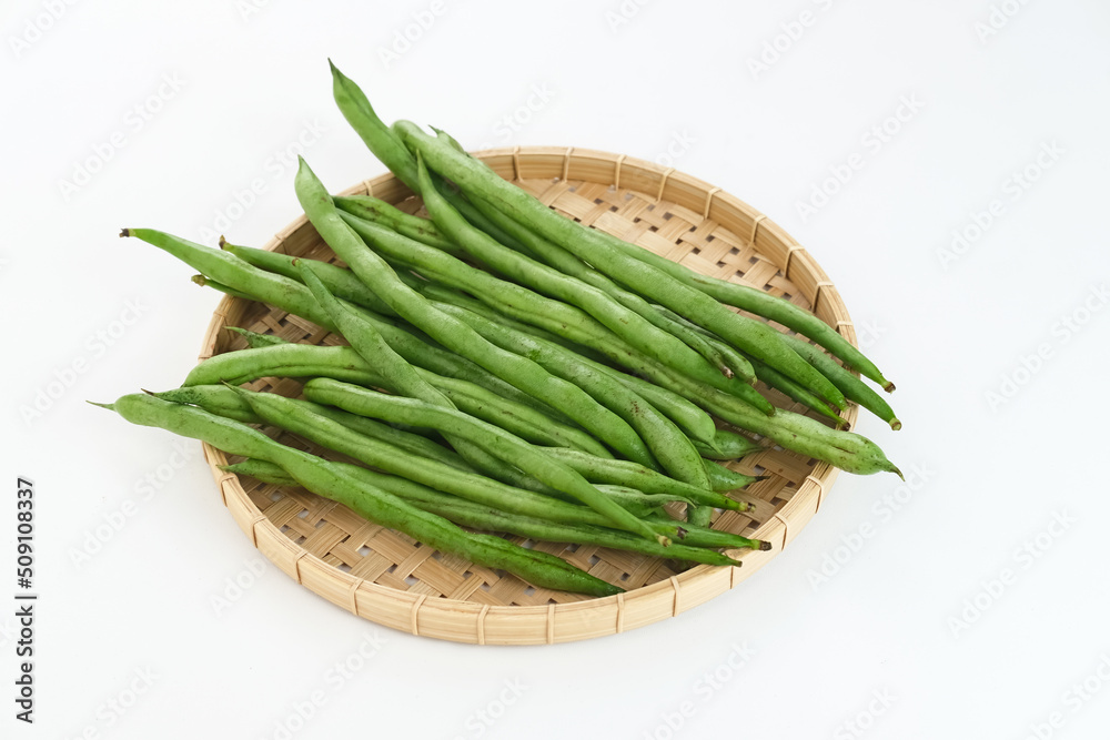 Buncis or Fresh raw string bean, legumes contain protein on white background.
Buncis or Fresh raw string bean, legumes contain protein on white background.
