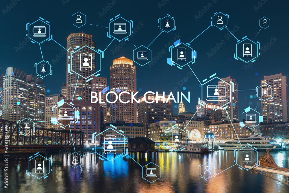 City view panorama of Boston Harbour and Seaport Blvd at night time, Massachusetts. Decentralized economy. Building exteriors of financial downtown. Blockchain and cryptography concept, hologram