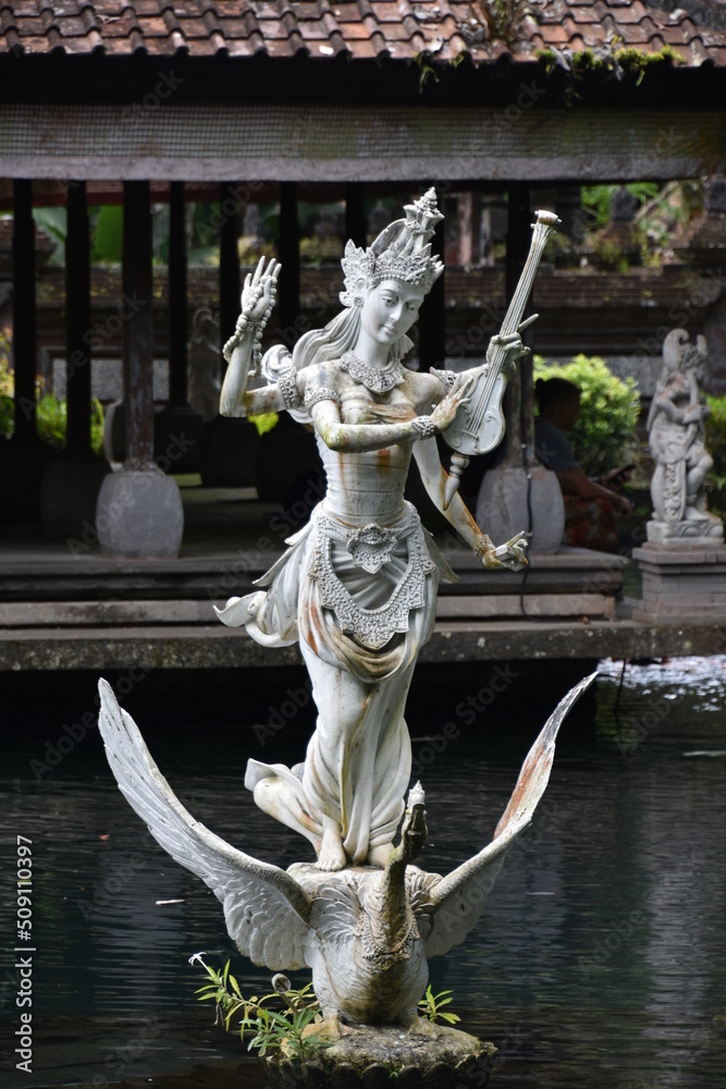 Saraswati Fountain Sculpture in Temple Pond at Pura Gunung Kawi, Bali, Portrait