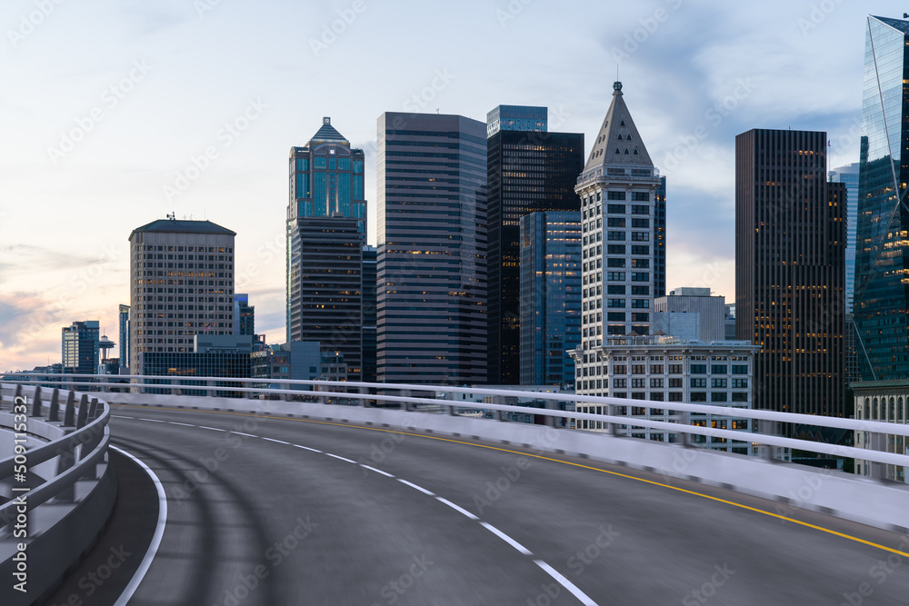 Empty urban asphalt road exterior with city buildings background. New modern highway concrete construction. Concept way to success. Transportation logistic industry fast delivery. Seattle. USA.