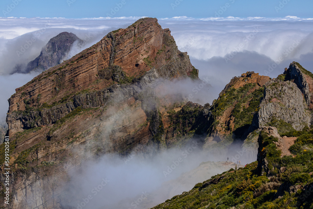 Mountain peaks over the clouds in Pico do Arieiro