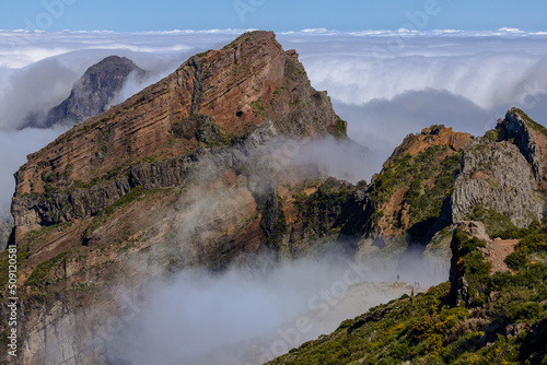 Mountain peaks over the clouds in Pico do Arieiro