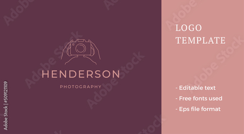 Minimalist human hands holding vintage photo camera line art logo with place for text vector